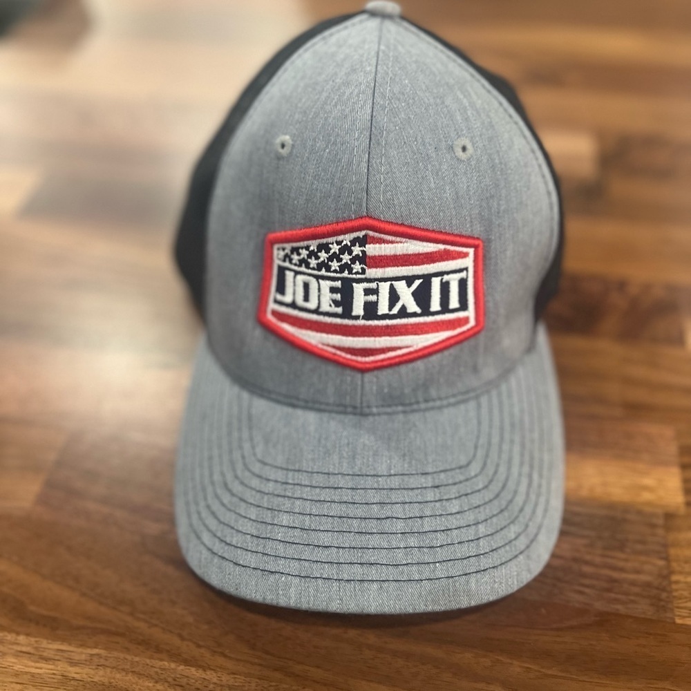Joe Fix It ball cap in used condition